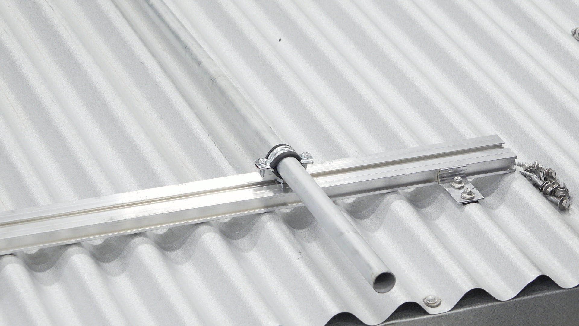 Secure Condensate Lines on Metal Roof